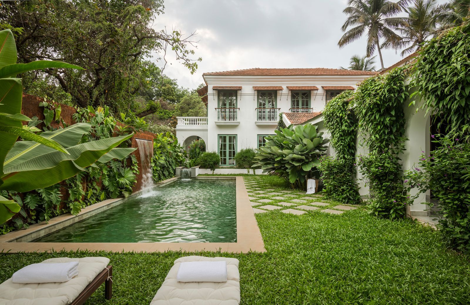 Lush courtyard garden and shaded veranda
